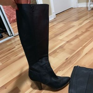 Black heeled knee high Frye boots